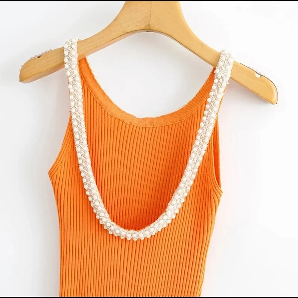Orange knit ribbed short dress with pearls